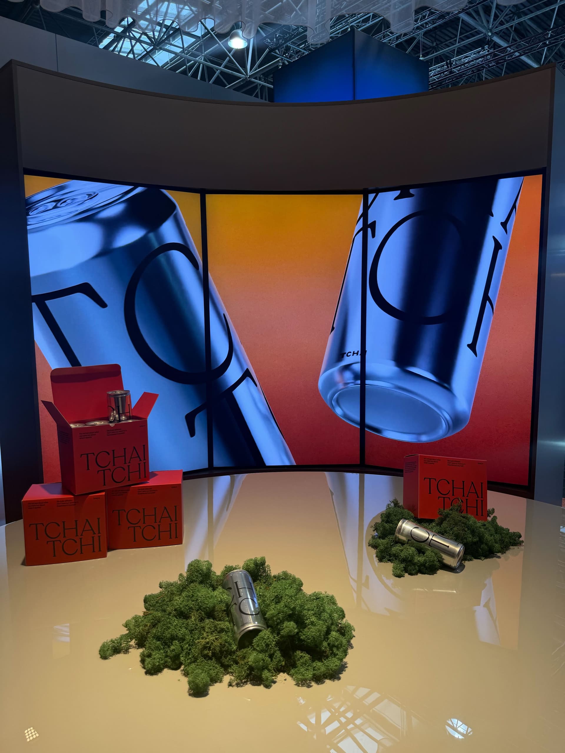 Tchai immersive booth with flowing curtains and lighting