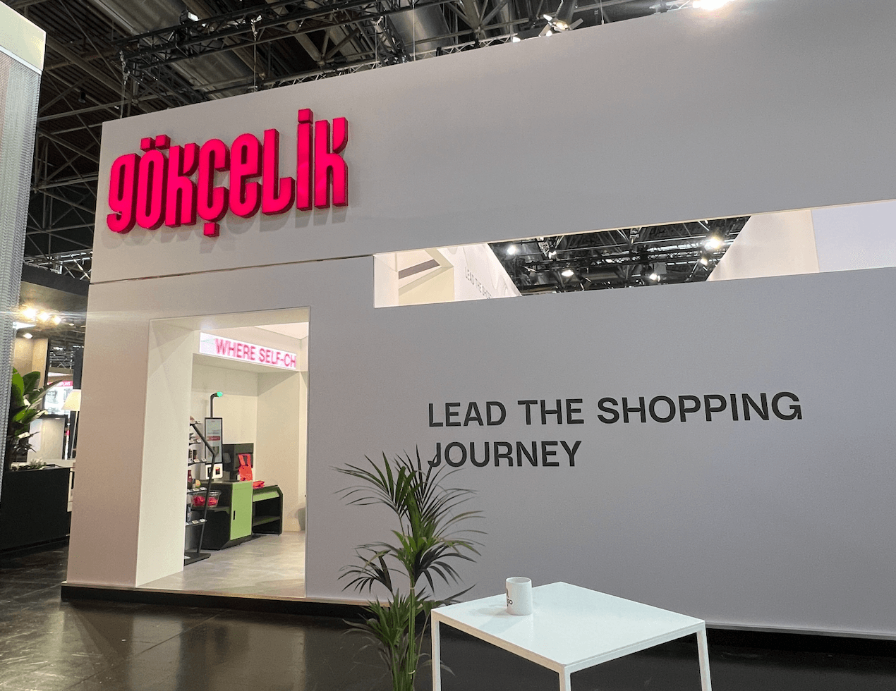 Gökçelik booth with Lead the Shopping Journey branding